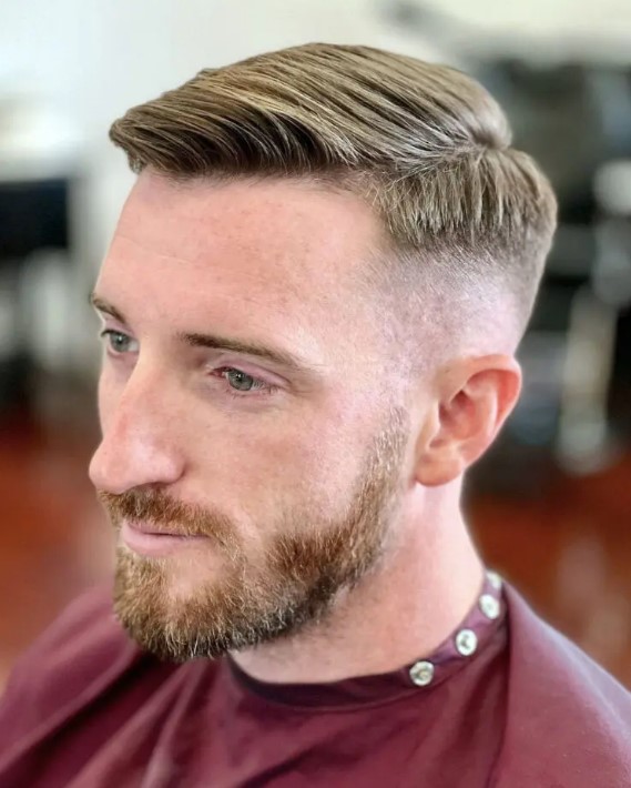 a side part haircut wiht a skin fade is a versatile idea that will easily match many outfits and doesn't require much styling
