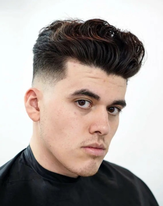 a tapered haircut with waves on top is a stylish and versatile idea that will sut every face shape