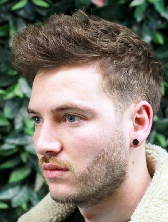 a textured classic haircut is long on top and short on the sides, with added texture to contrast the tapered sides