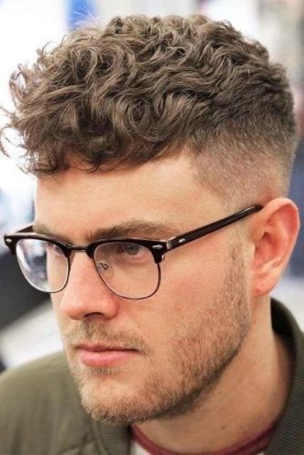 long and a bit wavy hair with a high fade is a fresh and modern solution if you want to control your waves