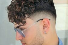 long curls with a long fringe and low skin fade is a lovely idea, don’t go too tight on the back and sides