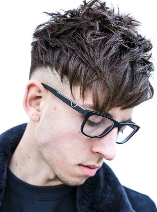 pocky strands all over the top, high fade and an angular fringe creat ea very edgy overall look
