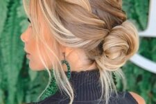 02 a beautiful and a bit messy low bun with a braided top, waves framing the face is adorable