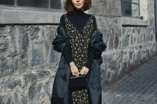 05 a black turtleneck, a moody floral midi dress over it, sock boots, a small bag and a puff midi coat