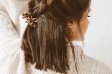 07 a creative dark brown half up wedding hairstyle with large braids on top and hair down is a cool idea for a boho bride or bridesmaid