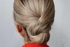 13 a knotted low bun with a sleek top is a perfect solution for medium and long hair, it looks elegant and chic