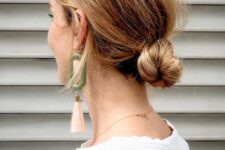 20 a messy twisted low bun with some volume is a cool and relaxed wedding hairstyle idea