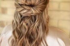 20 a twisted half updo with a bump on top and waves down is a cool idea for both a bride or a bridesmaid