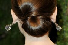 24 a elegant low chignon with a sideswept section is a very durable option for a picture-perfect look