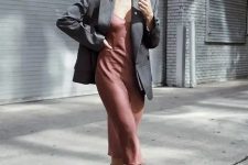 25 a mauve slip midi dress, a grey oversized blazer, black sock boots for a relaxed and minimal guest outfit