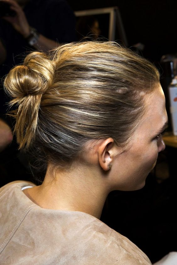 a twisted messy bun with a messy top is a cool idea if you want an effortless look without going too formal