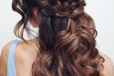 29 a beautiful boho half updo with a double braided halo and waves down, waves framing the face and caramel balayage that makes it cooler