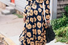 29 a navy floral maxi wrap dress with long sleeves, white shoes – just add a statement clutch and go