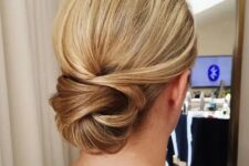 30 a low twisted chignon looks interesting and non-typical, perfect for an elegant look