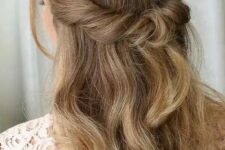 35 a beautiful looped half updo with waves down and face-framing locks is a cool idea for many styles