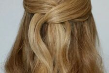 36 a beautiful and easy wrapped up half updo with a sleek top and waves down is a lovely idea