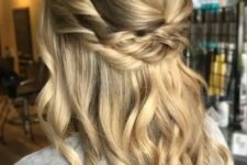 37 a blonde bridal half updo with a bump on top and a double twisted halo plus some waves down is a cool and lovely idea for a boho or rustic bride