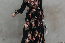 38 a sophisticated black maxi wrap wedding guest dress with long sleeves, blush shoes and a white bag for a fall or winter wedding