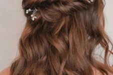 43 a brunette half updo with a twisted double halo and waves down, with pearl and rhinestone hair pins is chic and cool