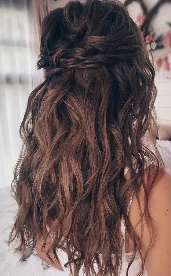 a catchy wavy half updo with a wavy bump on top, with a twisted touch and waves down is amazing