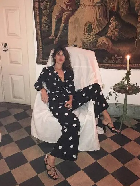 A black and white polka dot jumpsuit and strappy shoes   you need nothing else to look fantastic