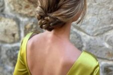 45 a refined braided low updo with a sleek top and face-framing locks is a stylish idea for mothers with long hair
