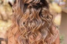 50 a cool boho wedding half updo with a twisted elements and waves down is a cool boho or rustic wedding hairstyle
