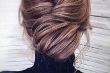 53 a super chic and elegant low chignon hairstyle with much volume and some bangs just wows