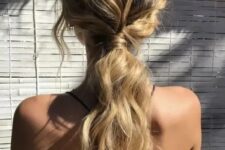 54 a wavy messy low ponytail with some locks down is great for a casual rehearsal dinner or a casual wedding