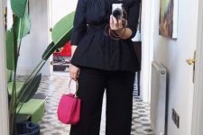 60 an eye-catching black outfit with a square neckline top, wideleg pants, grey shoes, a hot pink bag and statement earrings