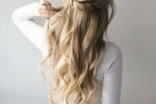 63 a lovely half updo with a twisted touch, a bump on top and waves down is a cool idea for a boho look