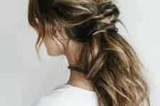 67 a messy low ponytail with a twisted part and some locks down is idea for hair with lowlights, a comfy modern hairstyle