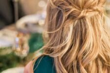 68 a messy twisted wavy half updo on long hair is a great relaxed idea that is suitable not only for a bridesmaid
