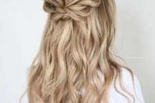 69 a pretty boho half updo with a dimensional bump, a loose braided halo and waves down is a cool idea for a bride or bridesmaid
