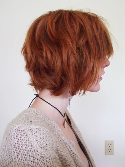 a bold copper red shaggy chin length bob with a lot of dimension and texture is a super fun idea