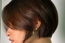 a brunette ear-length bob with side bangs is a lovely idea, it looks elegant and very refined