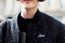 a classic ear-length brunette bob with wispy bangs is a hairstyle loved by models