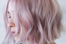 a cold pale pink A-line bob with waves and bleached touches is a catchy idea if you love cold shades