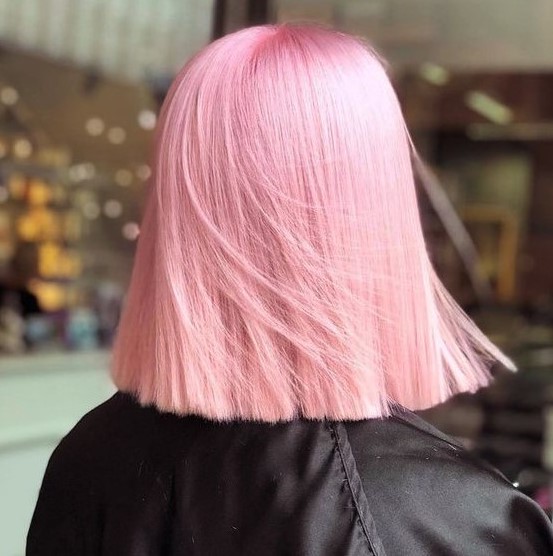 a cotton candy long bob with super straight hair is a fantastic statement with color and a trendy hair length