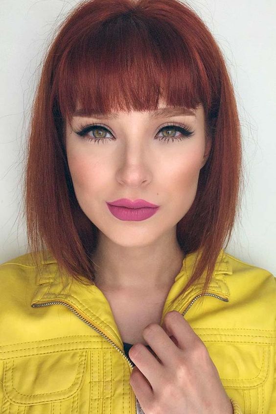 a deep red long bob with a classic fringe and some volume is a stylish and bold idea, it's timeless classics