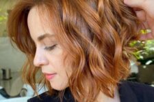 a delicate copper red wavy bob with volume is a cool and catchy idea if you don’t want too bright colors
