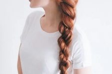 a ginger side twisted braid is a comfortable and cool idea for a boho or rustic bride with long hair