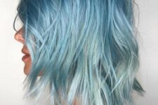 a gorgeous light blue with an icy tone long bob with layers and messy texture is an ultimate idea for summer
