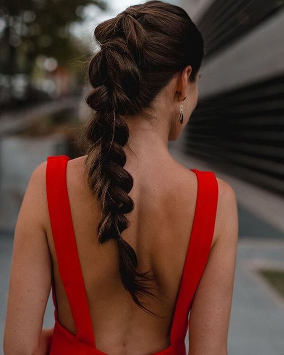 a gorgeous long loose fishtail braid with a volume on top is always a chic idea for both a wedding guest and a bridesmaid