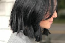 a long black bob with waves and volume is a catchy and stylish idea, with side bangs to accent the face
