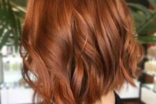 a long copper red wavy bob is an elegant and chic idea, this color isn’t too bright and is great for the fall