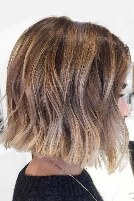 A lovely and catchy midi bronde bob with caramel highlights and bleached ends plus waves is super up to date
