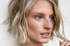 a lovely textured wavy chin-length bob with a darker root is a cool and modern idea to try