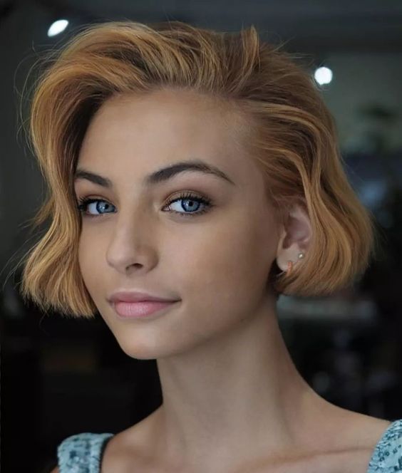 a pretty ginger ear length bob with waves and volume is a lovely idea, it catches an eye with color