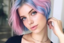 a pretty jaw-length bob with pastel blue and pink shades and a volume plus waves
